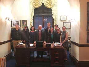 Standing behind VP Biden's former desk with Senator Coons.